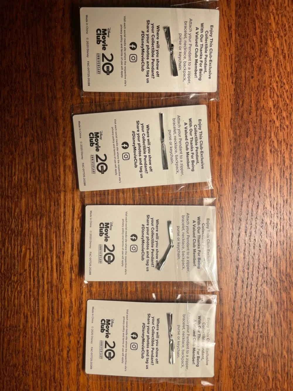 Disney 20th Anniversary Silver Movie Club Collectible Pendant Set - 4 Pack